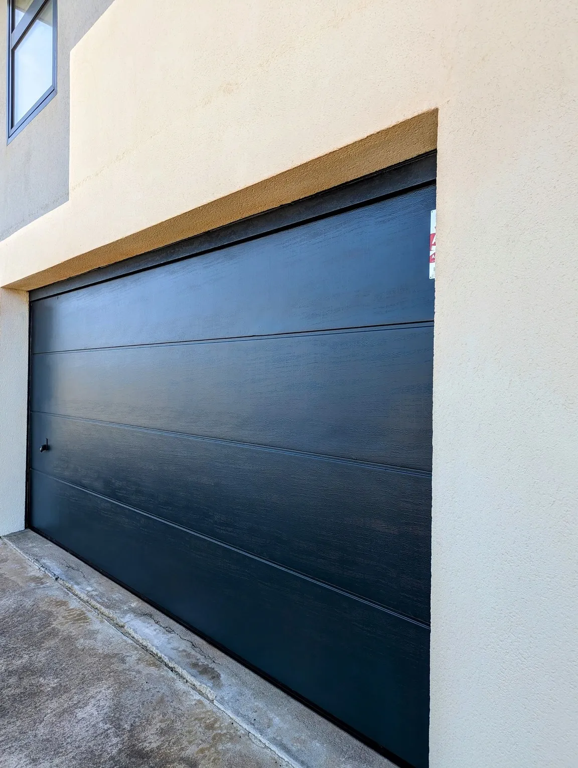 Après-intervention porte de garage.